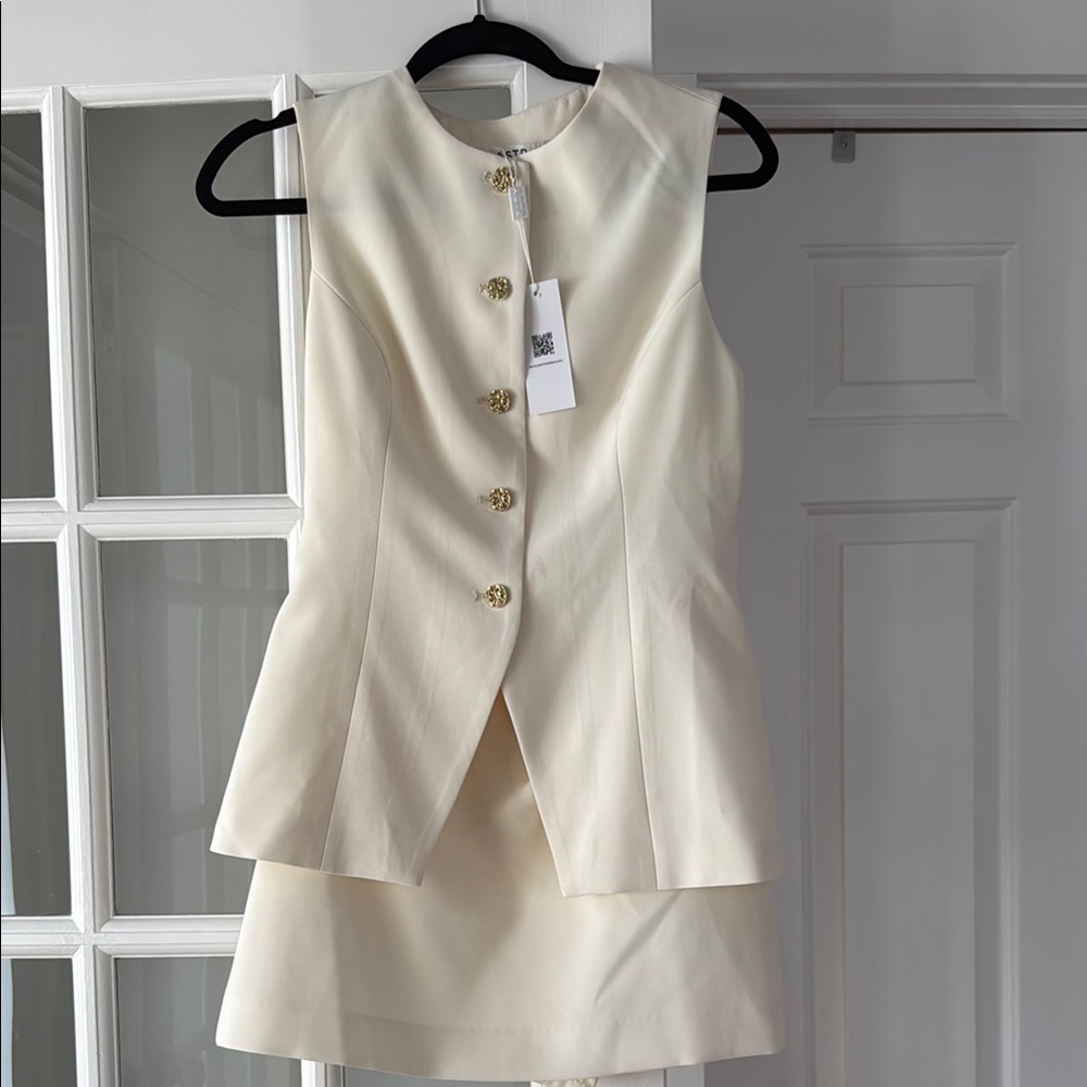 Astr Ivory Sleeveless Peplum Mini Dress with Gold Buttons